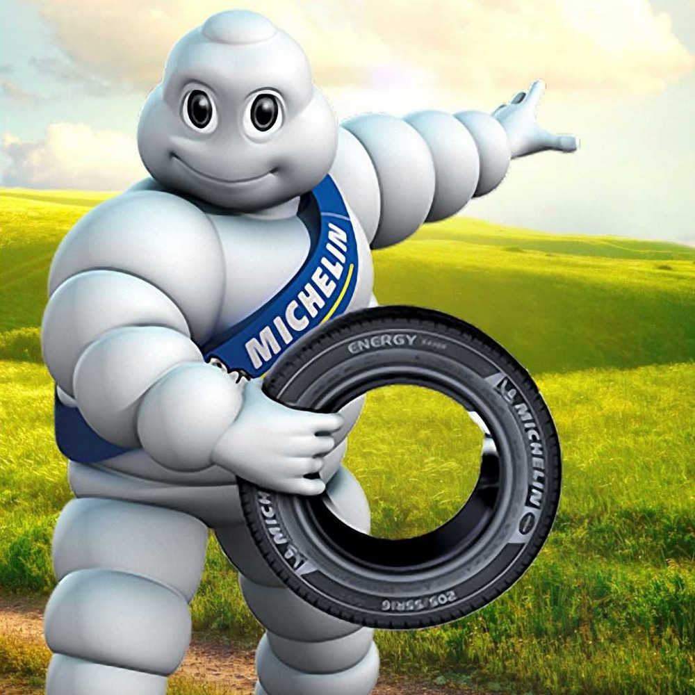 Почему составленный из шин символ компании Michelin Бибендум белый, а не чёрный?